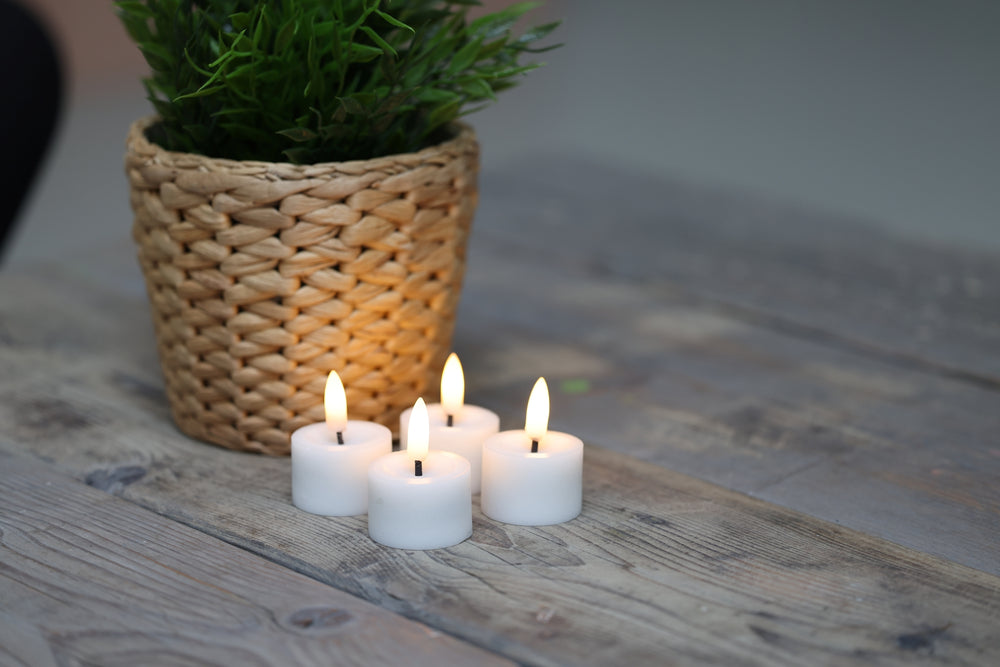 Fyrfadslys i voks - 4 pak - Flere farver